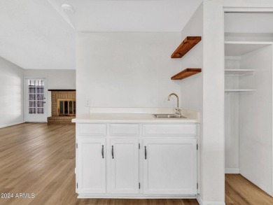 Step into this welcoming single-level townhome nestled in the on Bellaire Golf Club in Arizona - for sale on GolfHomes.com, golf home, golf lot
