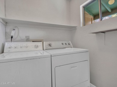 Step into this welcoming single-level townhome nestled in the on Bellaire Golf Club in Arizona - for sale on GolfHomes.com, golf home, golf lot