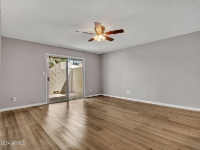 Step into this welcoming single-level townhome nestled in the on Bellaire Golf Club in Arizona - for sale on GolfHomes.com, golf home, golf lot