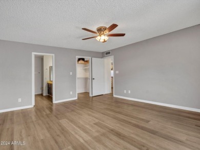 Step into this welcoming single-level townhome nestled in the on Bellaire Golf Club in Arizona - for sale on GolfHomes.com, golf home, golf lot