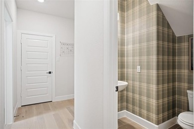 Popular Kerrville Plan on a corner lot with private tree line on Heath Golf and Yacht Club in Texas - for sale on GolfHomes.com, golf home, golf lot