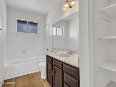 Step into this welcoming single-level townhome nestled in the on Bellaire Golf Club in Arizona - for sale on GolfHomes.com, golf home, golf lot
