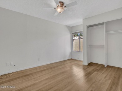 Step into this welcoming single-level townhome nestled in the on Bellaire Golf Club in Arizona - for sale on GolfHomes.com, golf home, golf lot
