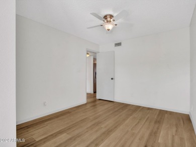 Step into this welcoming single-level townhome nestled in the on Bellaire Golf Club in Arizona - for sale on GolfHomes.com, golf home, golf lot