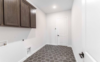 Family FRIENDLY !  The Frisco has it ALL with integrated kitchen on Heath Golf and Yacht Club in Texas - for sale on GolfHomes.com, golf home, golf lot