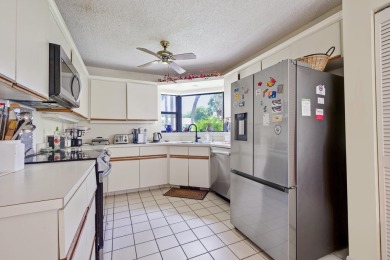 Welcome to this spacious 2-bedroom, 2-bath townhouse in the on Boca Delray Golf and Country Club in Florida - for sale on GolfHomes.com, golf home, golf lot