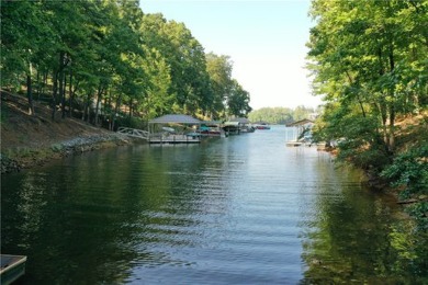 Welcome to the Golden Corner! This lot is a lake front one of on Keowee Key Golf and Country Club in South Carolina - for sale on GolfHomes.com, golf home, golf lot