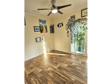 Welcome to a cheerful and inviting home tucked within the on Saint Andrews South Golf Club in Florida - for sale on GolfHomes.com, golf home, golf lot