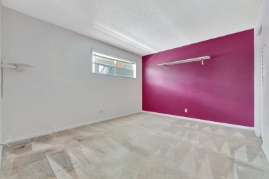 Enjoy peaceful living in this charming 2-bedroom, 2-bathroom on Inverrary Country Club in Florida - for sale on GolfHomes.com, golf home, golf lot