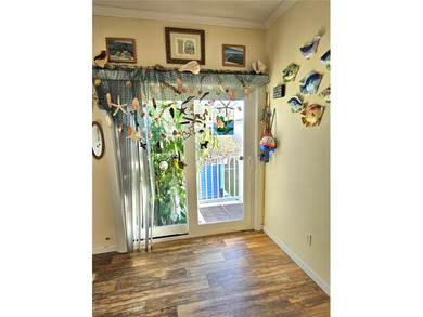 Welcome to a cheerful and inviting home tucked within the on Saint Andrews South Golf Club in Florida - for sale on GolfHomes.com, golf home, golf lot