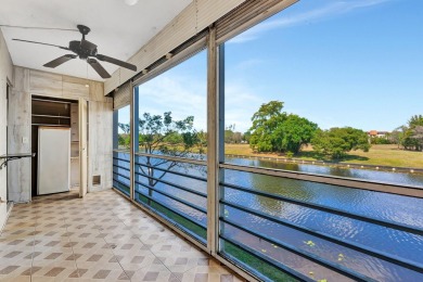 Enjoy peaceful living in this charming 2-bedroom, 2-bathroom on Inverrary Country Club in Florida - for sale on GolfHomes.com, golf home, golf lot