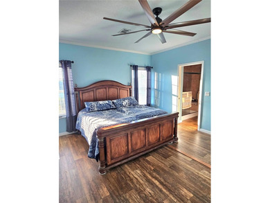 Welcome to a cheerful and inviting home tucked within the on Saint Andrews South Golf Club in Florida - for sale on GolfHomes.com, golf home, golf lot