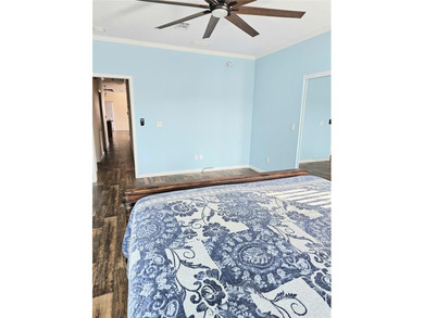 Welcome to a cheerful and inviting home tucked within the on Saint Andrews South Golf Club in Florida - for sale on GolfHomes.com, golf home, golf lot