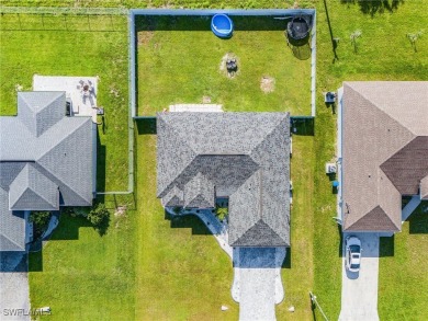 This beautiful 3-bedroom, 2-bathroom plus a DEN with closet home on Burnt Store Golf Club in Florida - for sale on GolfHomes.com, golf home, golf lot