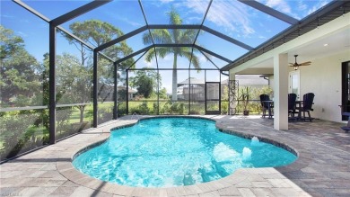 This exceptional pool home situated on the Coral Oaks Golf on Coral Oaks Golf Course in Florida - for sale on GolfHomes.com, golf home, golf lot