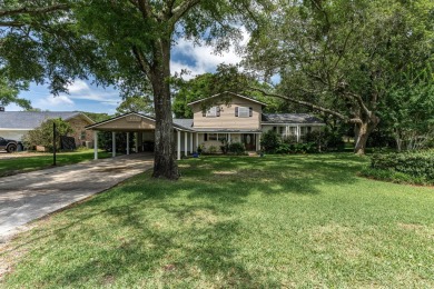 Spacious home in the highly sought-after Kenwood neighborhood on Fort Walton Beach Golf Course in Florida - for sale on GolfHomes.com, golf home, golf lot