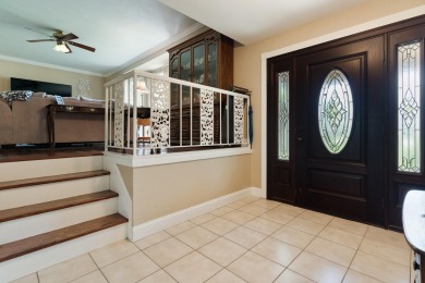 Spacious home in the highly sought-after Kenwood neighborhood on Fort Walton Beach Golf Course in Florida - for sale on GolfHomes.com, golf home, golf lot