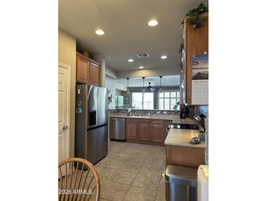 Enjoy breathtaking views of the San Tan Mountain from this on The Golf Club At Johnson Ranch in Arizona - for sale on GolfHomes.com, golf home, golf lot