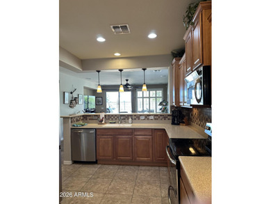 Enjoy breathtaking views of the San Tan Mountain from this on The Golf Club At Johnson Ranch in Arizona - for sale on GolfHomes.com, golf home, golf lot