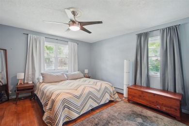 Welcome to this beautifully updated mid-century modern ranch in on Wakonda Club in Iowa - for sale on GolfHomes.com, golf home, golf lot