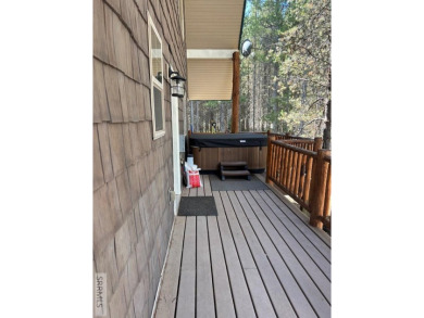 This big beautiful home has been used as a rental and has  made on Island Park Village Resort Golf Course in Idaho - for sale on GolfHomes.com, golf home, golf lot