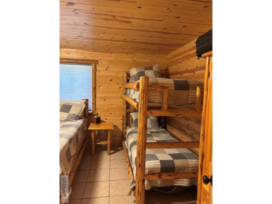 This big beautiful home has been used as a rental and has  made on Island Park Village Resort Golf Course in Idaho - for sale on GolfHomes.com, golf home, golf lot