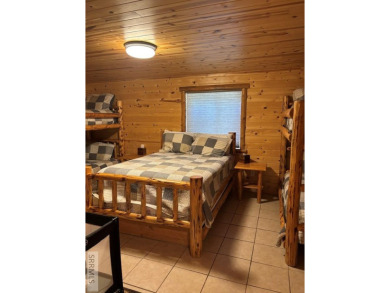 This big beautiful home has been used as a rental and has  made on Island Park Village Resort Golf Course in Idaho - for sale on GolfHomes.com, golf home, golf lot
