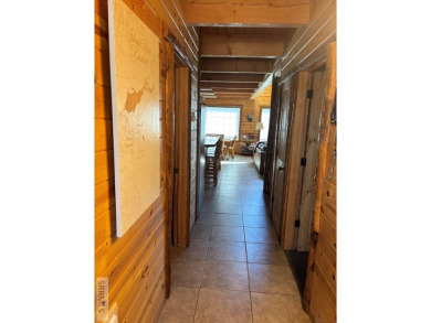 This big beautiful home has been used as a rental and has  made on Island Park Village Resort Golf Course in Idaho - for sale on GolfHomes.com, golf home, golf lot