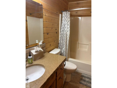 This big beautiful home has been used as a rental and has  made on Island Park Village Resort Golf Course in Idaho - for sale on GolfHomes.com, golf home, golf lot