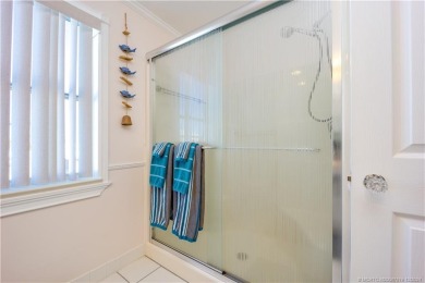 This residence boasts a spacious, open-concept design, perfectly on Island Dunes Country Club in Florida - for sale on GolfHomes.com, golf home, golf lot