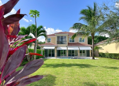This stunning home is located in the coveted neighborhood of on Palm Beach Polo and Country Club in Florida - for sale on GolfHomes.com, golf home, golf lot