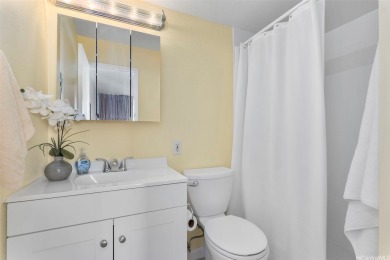 Located across from Pearlridge Center, this modern, renovated 2 on Pearl Country Club in Hawaii - for sale on GolfHomes.com, golf home, golf lot