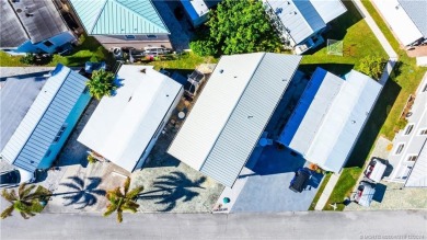 This residence boasts a spacious, open-concept design, perfectly on Island Dunes Country Club in Florida - for sale on GolfHomes.com, golf home, golf lot