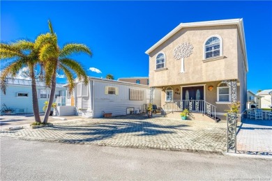 This residence boasts a spacious, open-concept design, perfectly on Island Dunes Country Club in Florida - for sale on GolfHomes.com, golf home, golf lot