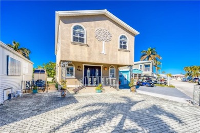This residence boasts a spacious, open-concept design, perfectly on Island Dunes Country Club in Florida - for sale on GolfHomes.com, golf home, golf lot