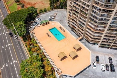 Located across from Pearlridge Center, this modern, renovated 2 on Pearl Country Club in Hawaii - for sale on GolfHomes.com, golf home, golf lot