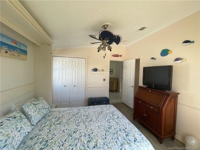 This residence boasts a spacious, open-concept design, perfectly on Island Dunes Country Club in Florida - for sale on GolfHomes.com, golf home, golf lot