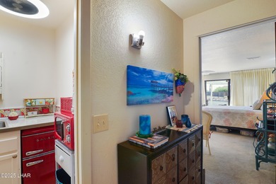 Tremendous opportunity in a terrific neighborhood! This unique on London Bridge Golf Course in Arizona - for sale on GolfHomes.com, golf home, golf lot