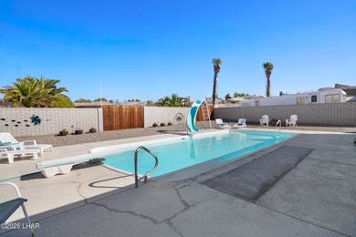 Tremendous opportunity in a terrific neighborhood! This unique on London Bridge Golf Course in Arizona - for sale on GolfHomes.com, golf home, golf lot