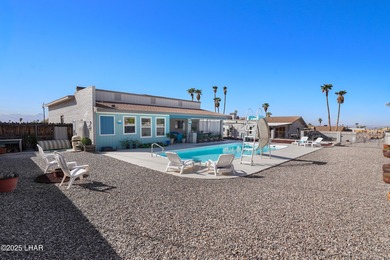 Tremendous opportunity in a terrific neighborhood! This unique on London Bridge Golf Course in Arizona - for sale on GolfHomes.com, golf home, golf lot