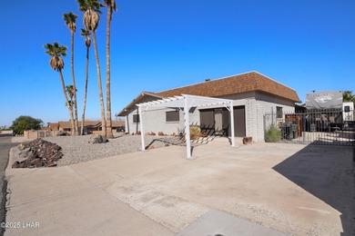 Tremendous opportunity in a terrific neighborhood! This unique on London Bridge Golf Course in Arizona - for sale on GolfHomes.com, golf home, golf lot