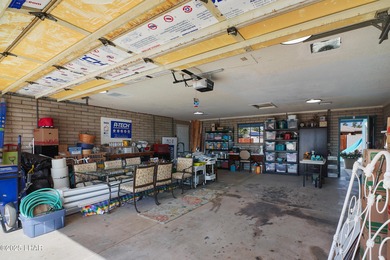 Tremendous opportunity in a terrific neighborhood! This unique on London Bridge Golf Course in Arizona - for sale on GolfHomes.com, golf home, golf lot