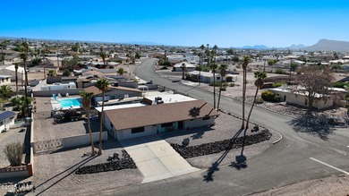 Tremendous opportunity in a terrific neighborhood! This unique on London Bridge Golf Course in Arizona - for sale on GolfHomes.com, golf home, golf lot