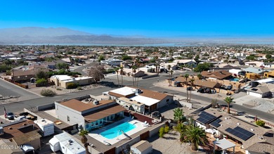 Tremendous opportunity in a terrific neighborhood! This unique on London Bridge Golf Course in Arizona - for sale on GolfHomes.com, golf home, golf lot