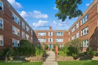 Welcome home to this desirable second floor corner unit drenched on Robert Black Golf Course in Illinois - for sale on GolfHomes.com, golf home, golf lot