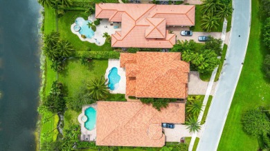 This stunning home is located in the coveted neighborhood of on Palm Beach Polo and Country Club in Florida - for sale on GolfHomes.com, golf home, golf lot