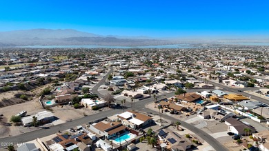 Tremendous opportunity in a terrific neighborhood! This unique on London Bridge Golf Course in Arizona - for sale on GolfHomes.com, golf home, golf lot