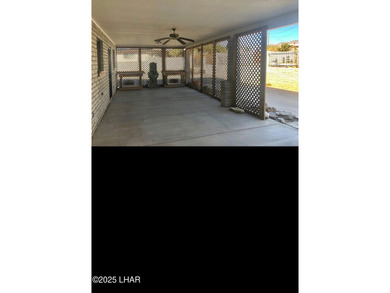 Tremendous opportunity in a terrific neighborhood! This unique on London Bridge Golf Course in Arizona - for sale on GolfHomes.com, golf home, golf lot