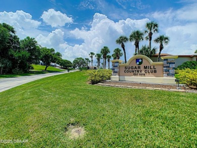 Beautiful Sugar Mill Country Club home located next to the 5th on Sugar Mill Country Club in Florida - for sale on GolfHomes.com, golf home, golf lot