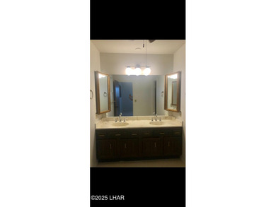 Tremendous opportunity in a terrific neighborhood! This unique on London Bridge Golf Course in Arizona - for sale on GolfHomes.com, golf home, golf lot